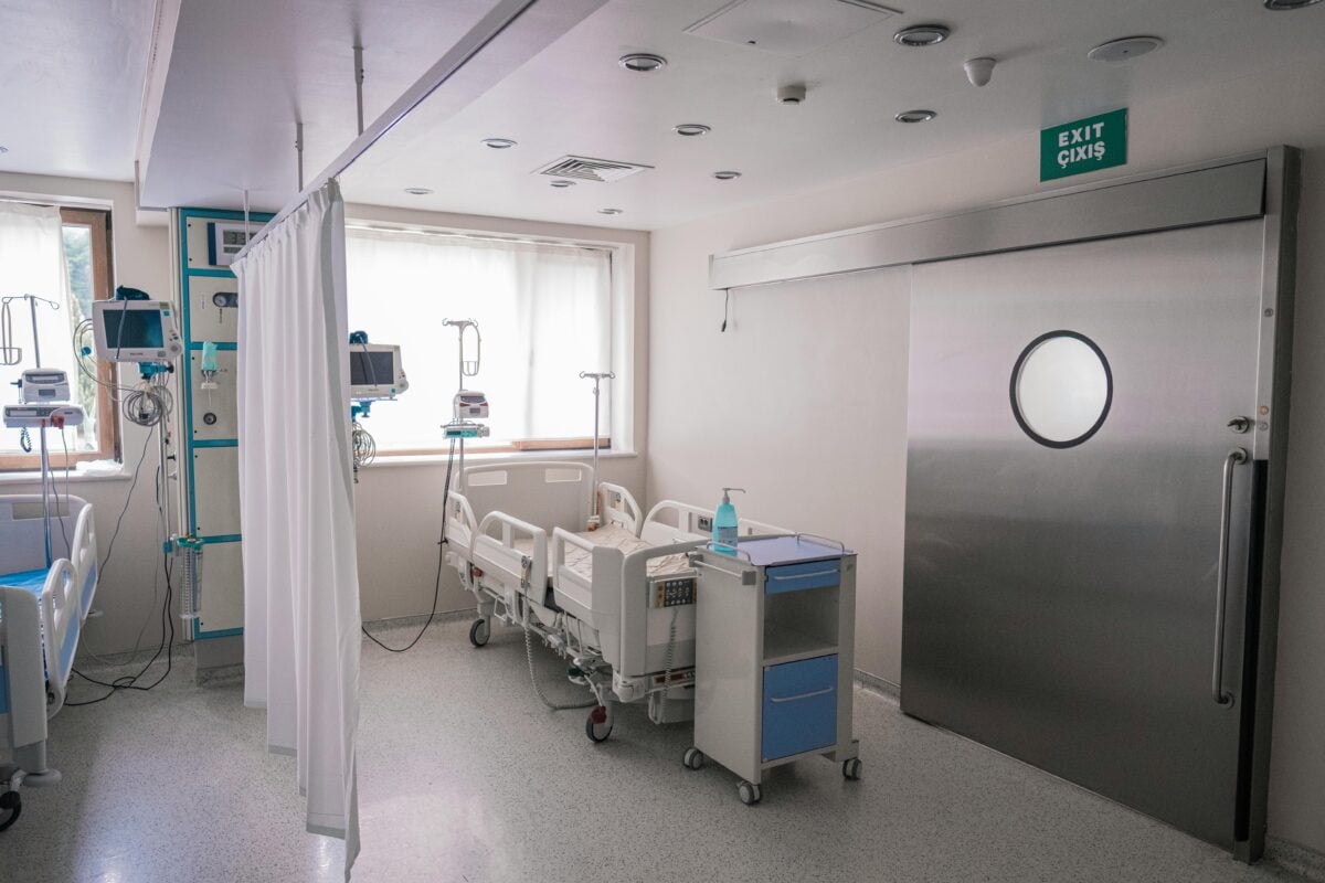 Spacious hospital room in Baku featuring medical beds and equipment.