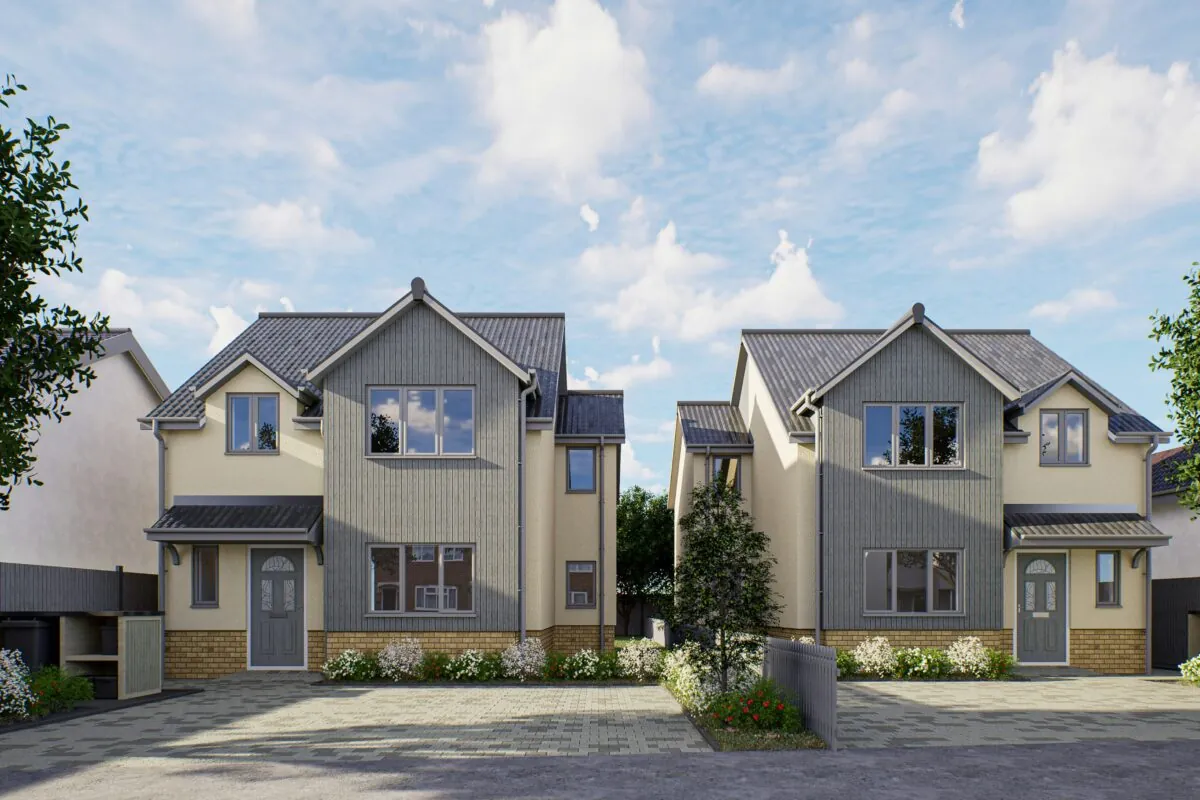 Two pale cream coloured dethatched houses, with grey roofs. Built by SME developers in the UK under the guidance of Brookbanks.